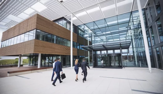 business-people-entering-office-building