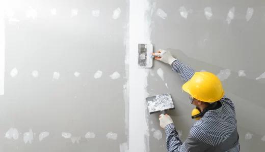 construction-worker-making-walls-from-gypsum-plasterboard